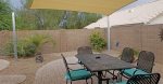 Outside shade sail added to part of patio and backyard
